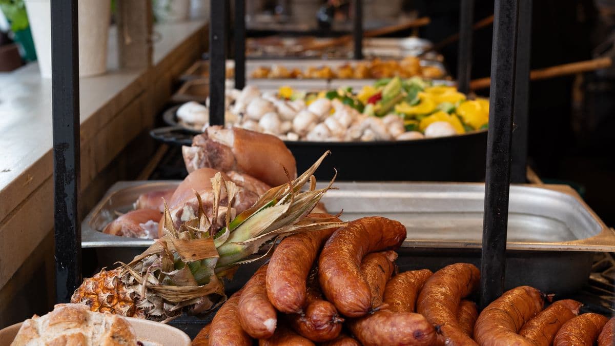 Traditional Polish sausages and bread at a street-food market in Kraków, Poland.